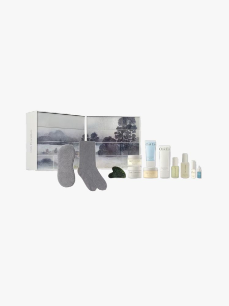 Oak Essentials x Jenni Kayne Advent Calendar in multiple branded components on a light gray background